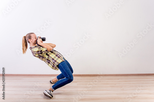 different photographer poses: bending, squatting, lying down