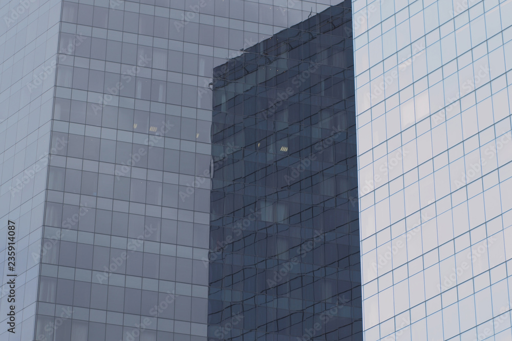 photo of high-rise buildings of glass and metal photo of high-rise buildings of glass and metal