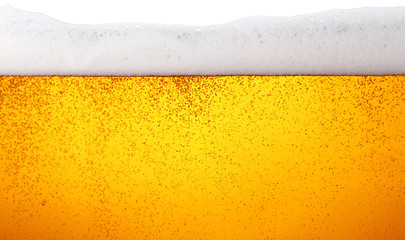 Close up background of beer with bubbles in glass