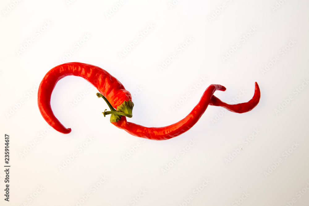 Red pepper on white isolated background. Pattern Red pepper on white isolated background. Pattern