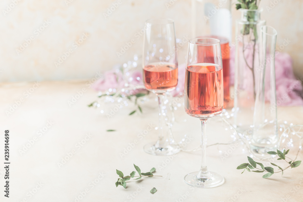 Two glasses and bottle of rose wine