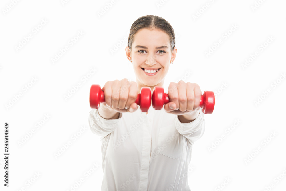 Young pretty business woman working out with dumbbells Young pretty business woman working out with dumbbells