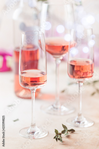 Glasses and bottle of rose wine