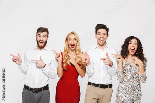 Group of cheerful smart dressed friends