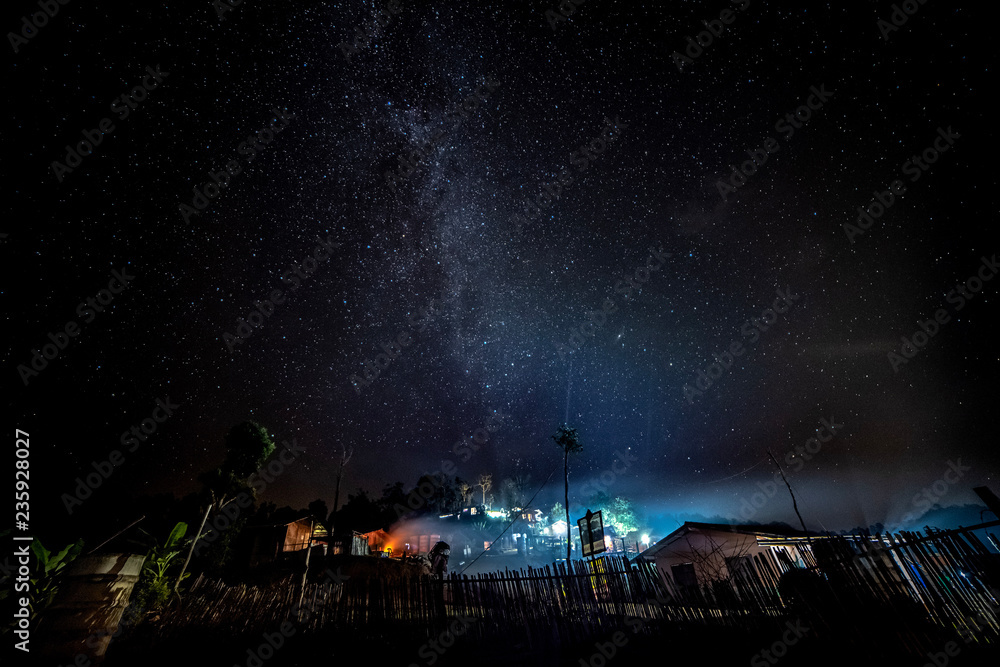 Chiang Dao, Thailand, we can see the Milky Way galaxy and stars in the evening sky. The place is famous and popular among travelers.