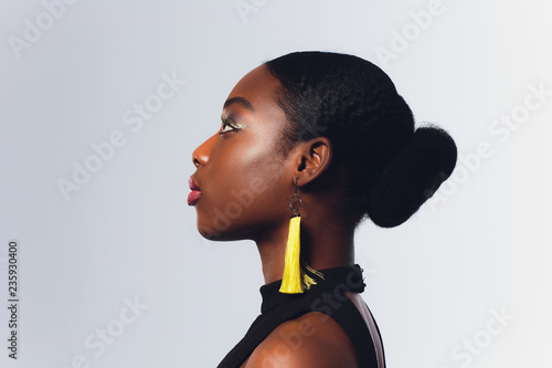 Close-up of pretty African American woman. isolated on white