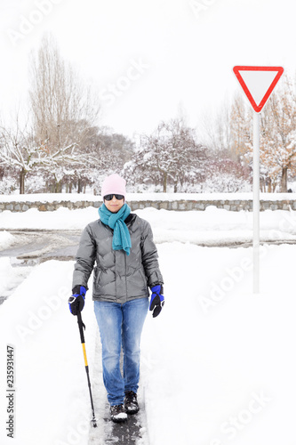 Woman walking and having fun on a cold winter day