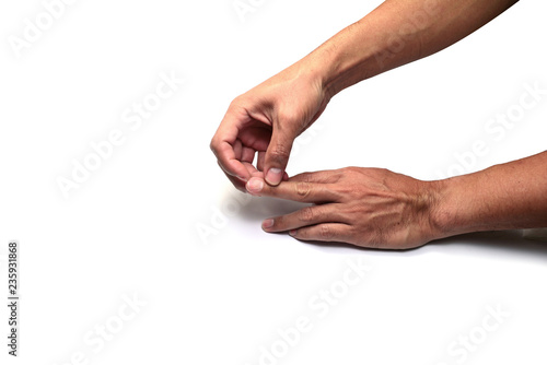 Photography the finger of right hand provoking the nail of left hand on white background iso