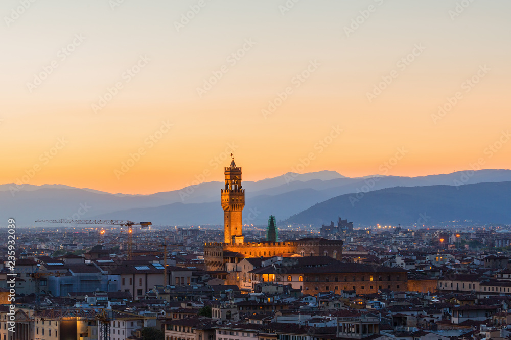 Sunset over the city of Florence with Palazzo Vecchio