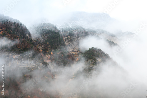 misty landscape at foggy mountains