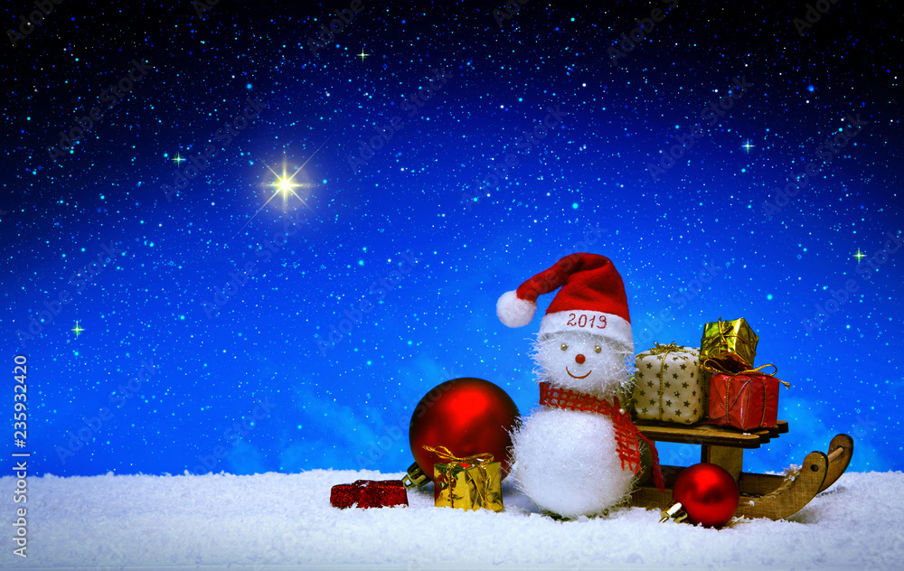 Christmas snowman with santa claus hat isolated on star sky background.