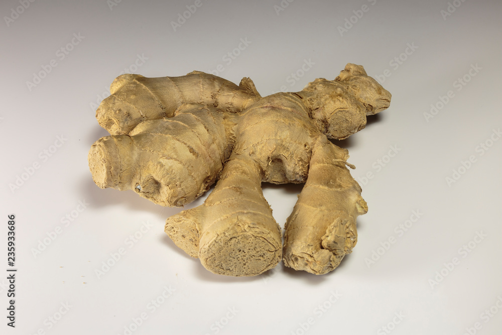 Ginger root on a white background, Asian food and popular Asian spice.