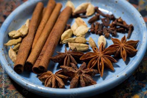 spices for masala tea in a plate