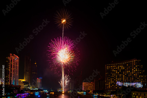 colorul fireworks at river, bangkok cityscape, Thailand in loykratong festivl night © lukyeee_nuttawut