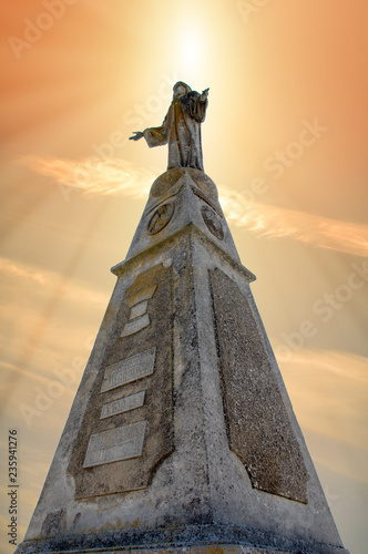 Statue of the Christ of Medinaceli at sunrise photo