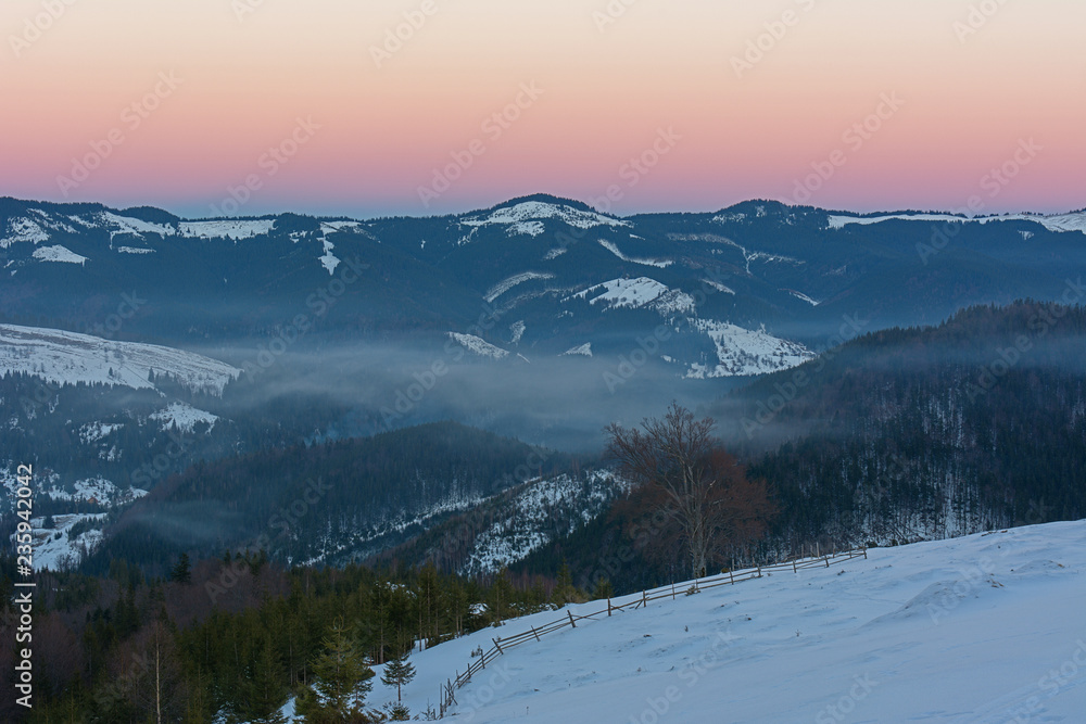 Sunset in the mountains in winter Sunset in the mountains in winter