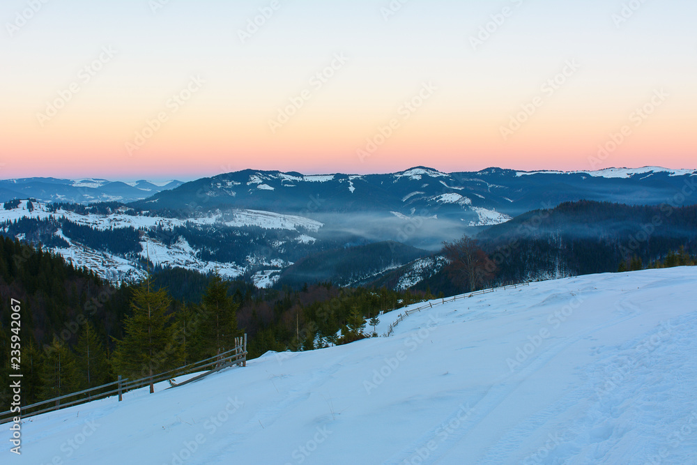Sunset in the mountains in winter