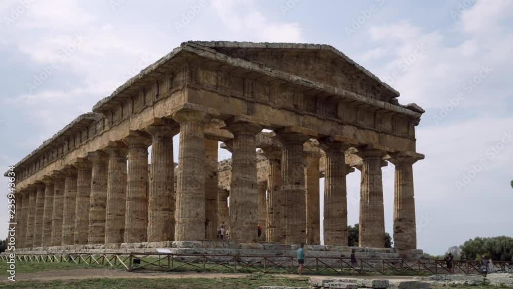 Time Lapse. Zoom out. Second Temple of Hera, a Greek temple in Paestum, Italy. 4K. Time Lapse. Zoom out. Second Temple of Hera, a Greek temple in Paestum, Italy. 4K.