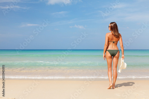 Young attractive woman relax on the sea beach