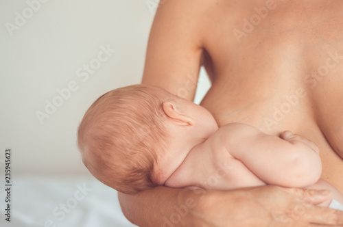 mother and baby, breastfeeding photo