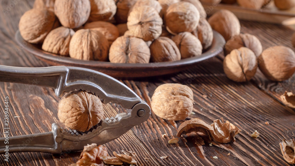 Shelled walnuts. On a wooden table. Top view Shelled walnuts. On a wooden table. Top view