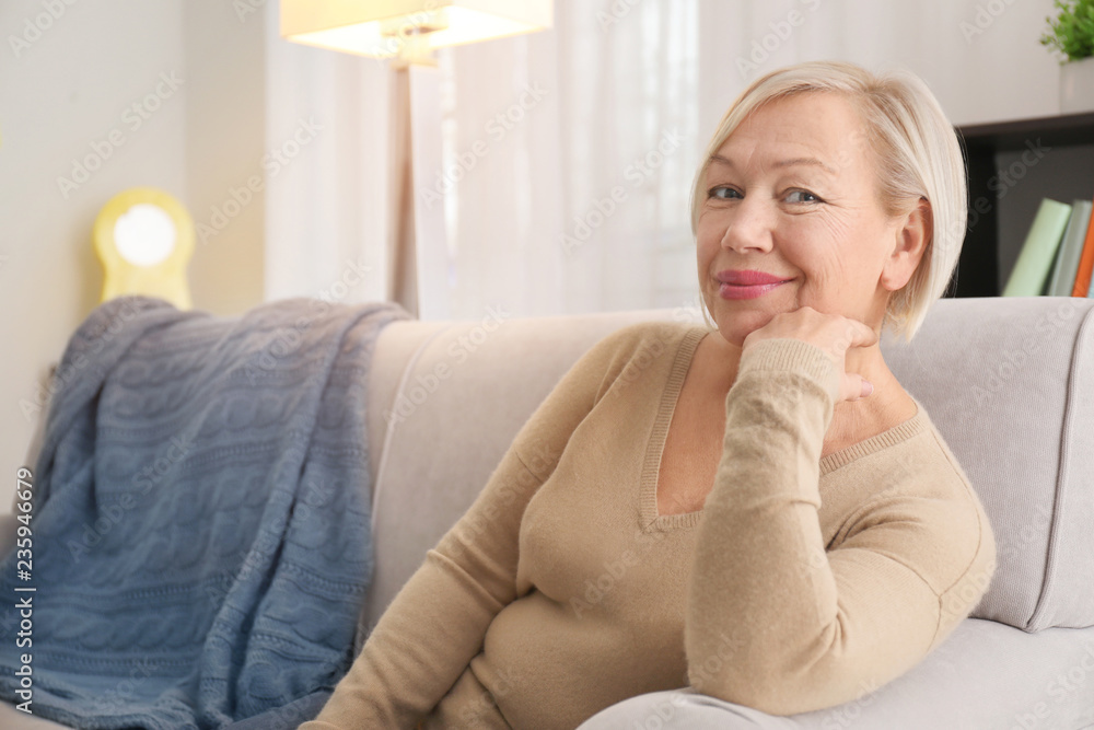 Portrait of beautiful mature woman resting at home Portrait of beautiful mature woman resting at home