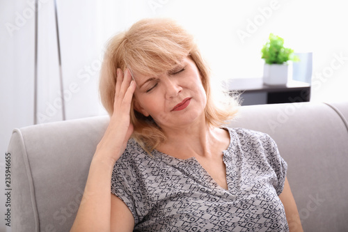 Mature woman suffering from...