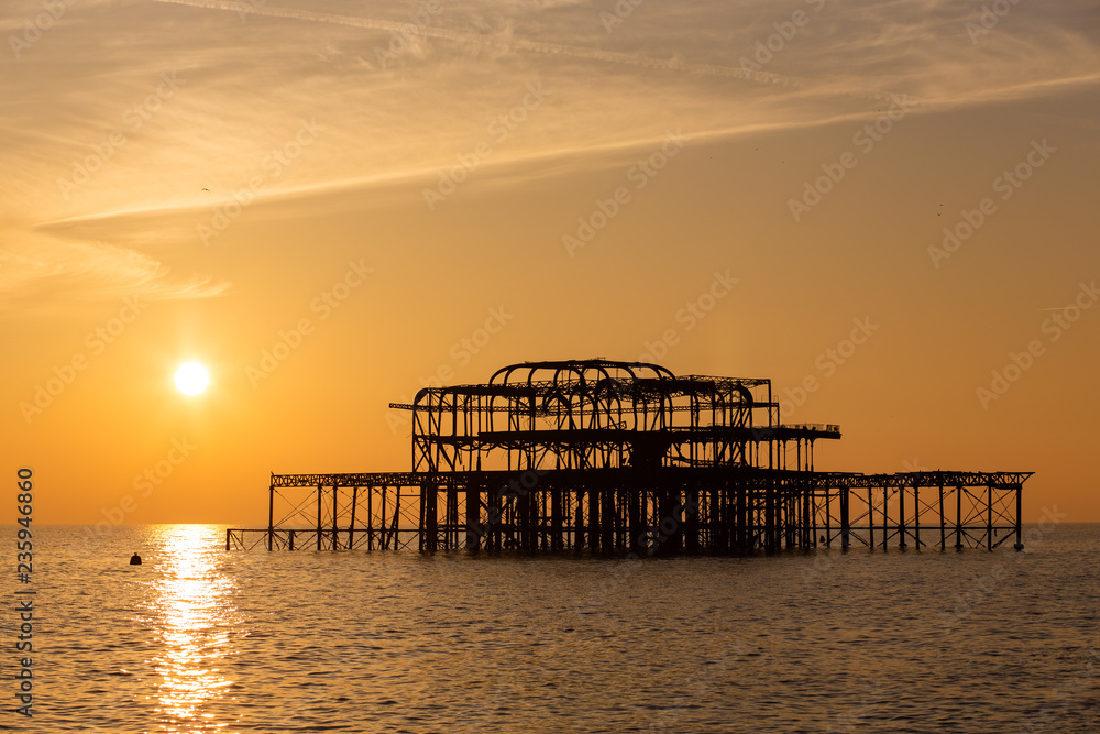 Sunset on a beautiful winter day over the ruins of Brighton's famous West Pier, UK