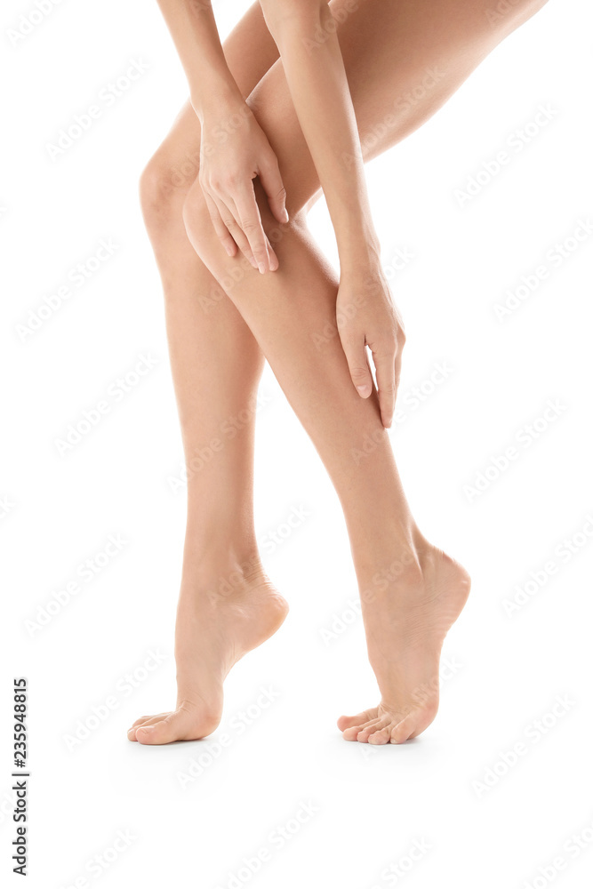 Young woman with beautiful long legs on white background, closeup Young woman with beautiful long legs on white background, closeup