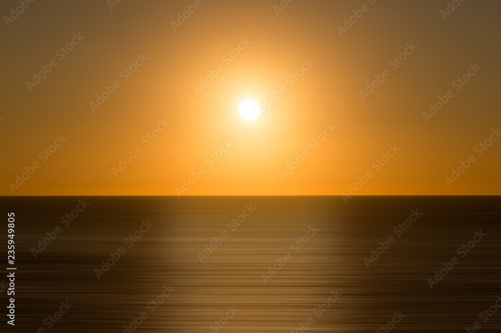Background of a golden sunrise in the sea