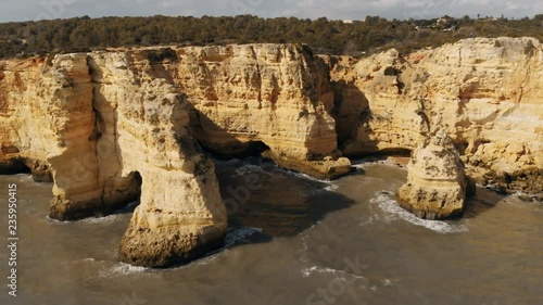 Arched rock in Marinha beach in Lagoa Algarve Portugal