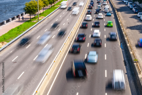 Abstract and blurred background of the many cars in street. Blurred motion
