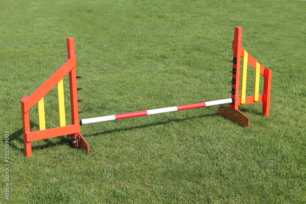 A Jump Obstacle on a Dog Agility Training Course. A Jump Obstacle on a Dog Agility Training Course.