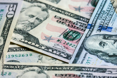 Closeup of dollar banknotes. American cash money background.