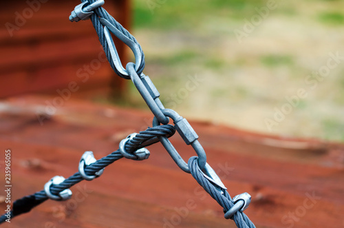 steel cables fastening safety harness.  equipment for rope park