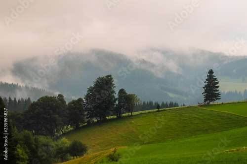 Beautiful cloudy mountain landscape in Austrian countryside.