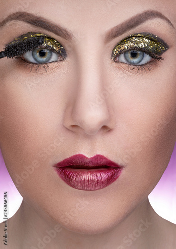 close-up portrait of female model during make-up