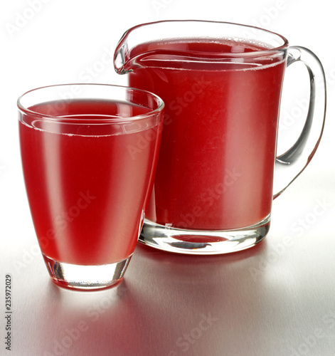 GLASS AND JUG OF CHERRY JUICE