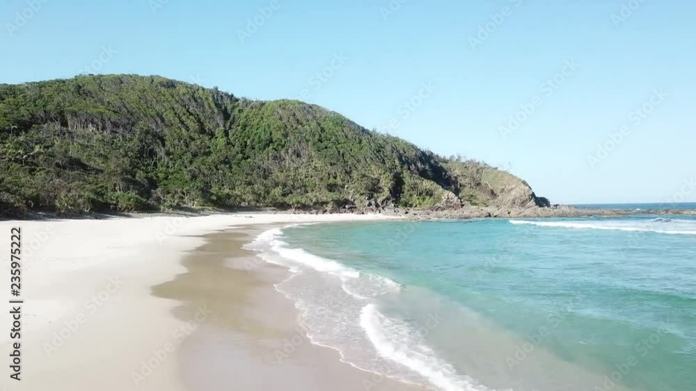 Brunette young woman walking lonely in a beautiful tropical beach Brunette young woman walking lonely in a beautiful tropical beach