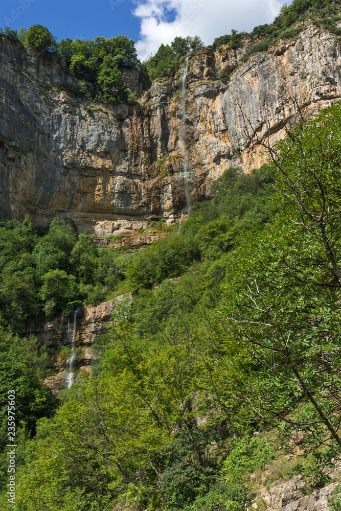 Green forest around Waterfall Skaklya near village of Zasele at Vazov trail, Balkan Mountains, Bulgaria