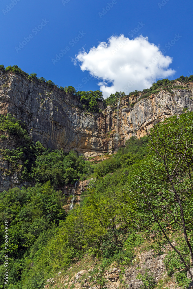 Green forest around Waterfall Skaklya near village of Zasele at Vazov trail, Balkan Mountains, Bulgaria