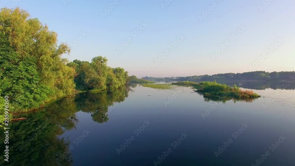 fly over island on the river 4K, 4K aeria view of island with reed, reeded island on the river, top view of reeded island, 4K aerial view flight over lake island, fly over island on the river 4K, 4K aeria view of island with reed, reeded island on the river, top view of reeded island, 4K aerial view flight over lake island,