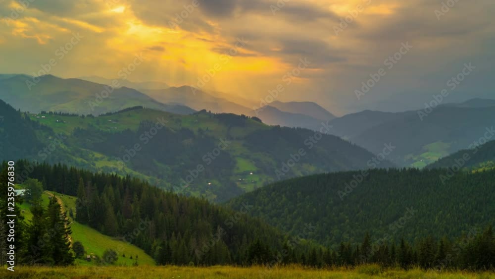 The Mountain Forest on Background of Sunset. Dramatic Sunset Sky. Timelapse. 4K. The Mountain Forest on Background of Sunset. Dramatic Sunset Sky. Timelapse. 4K.