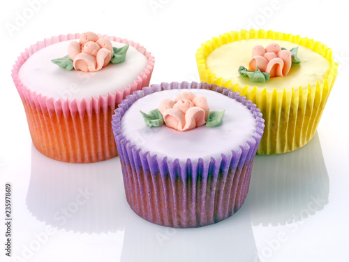 THREE PASTEL CUPCAKES