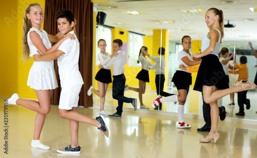 Boys and girls enjoying active dance
