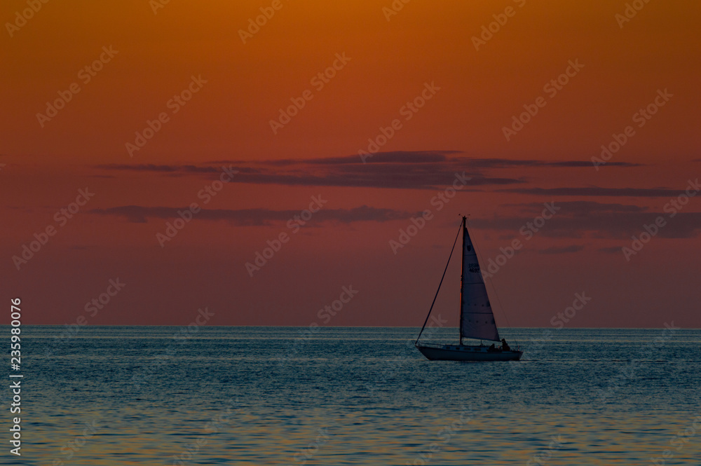 Fototapeta premium Sailing into the Sunset on Lake Ontario