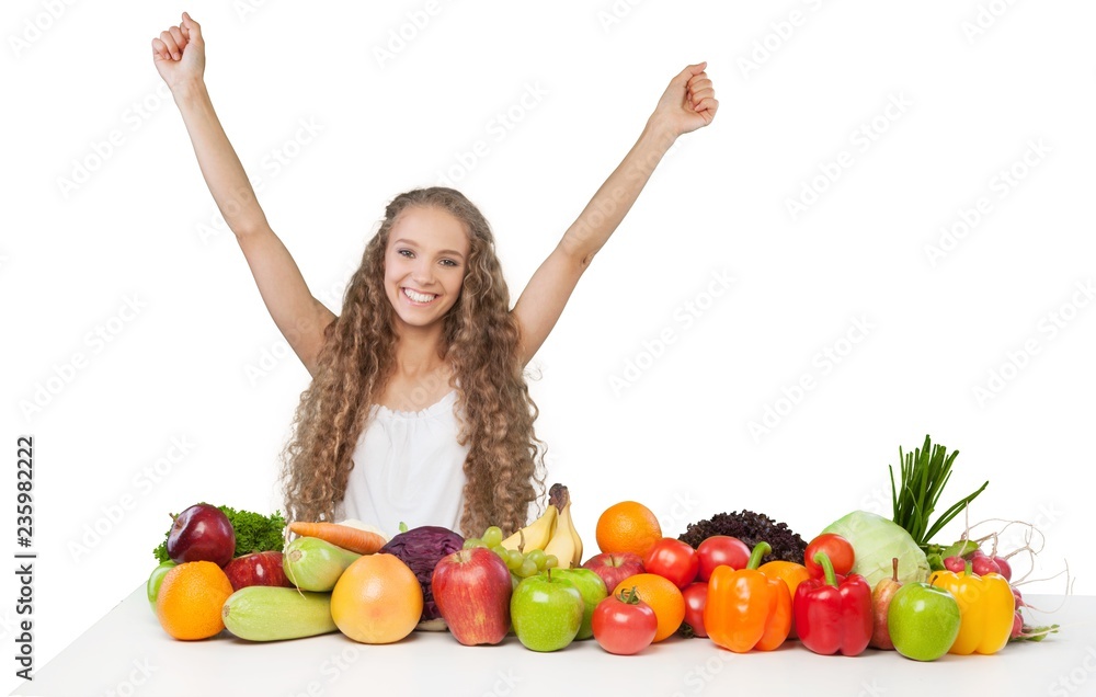 Portrait of a Happy Young Woman with Vegetables and Fruits