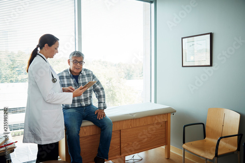 Doctor talking to man