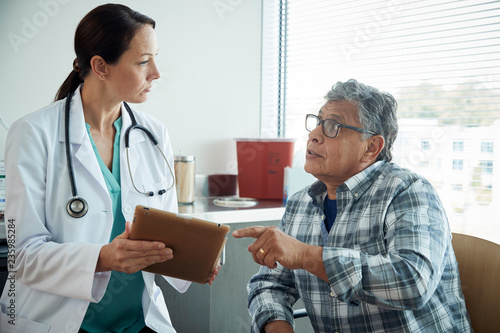 Doctor talking to man