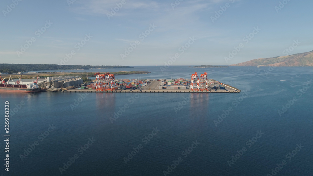 Sea cargo port with cranes, docks, containers in Subic Bay. Philippines,Luzon. Aerial view: cargo port and container terminal.